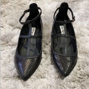 Black Steve Madden flat sandals size 7.